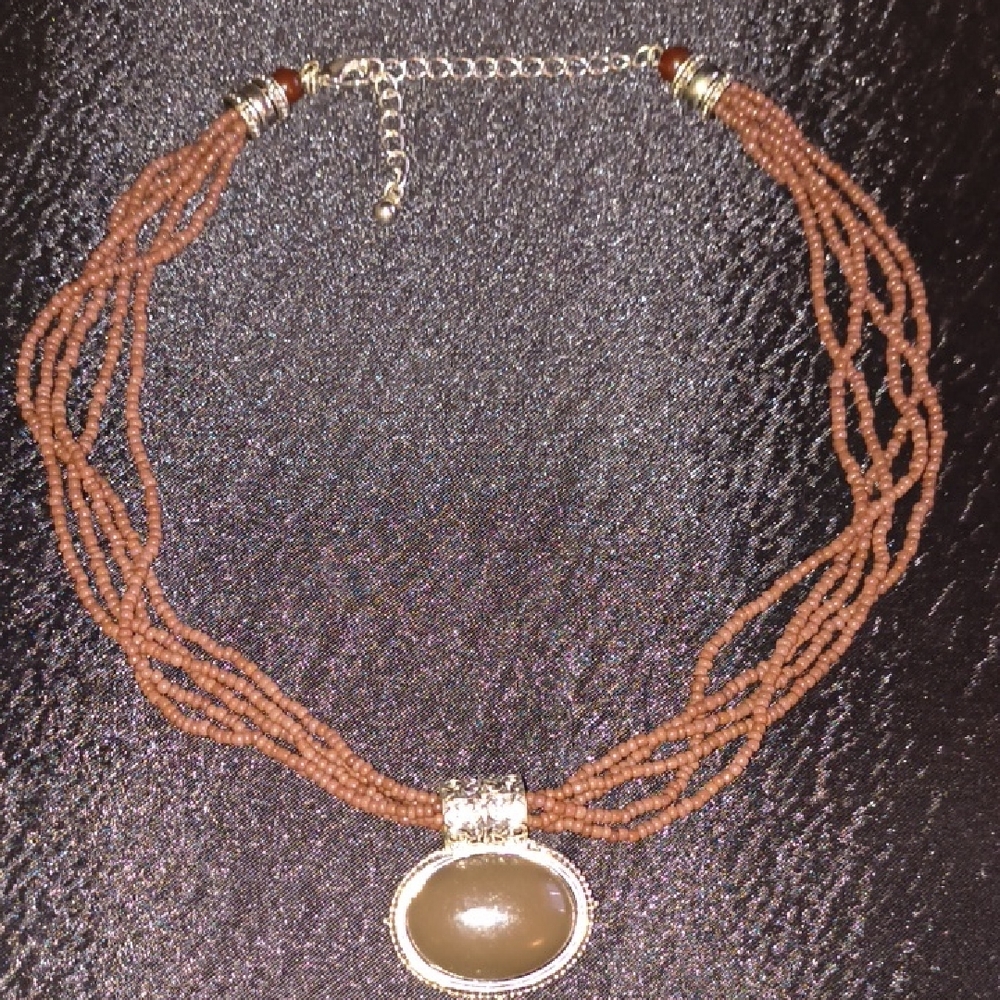 Elegant Multi Strand Brown Seed Bead Necklace with Silver and Brown Oval Pendant